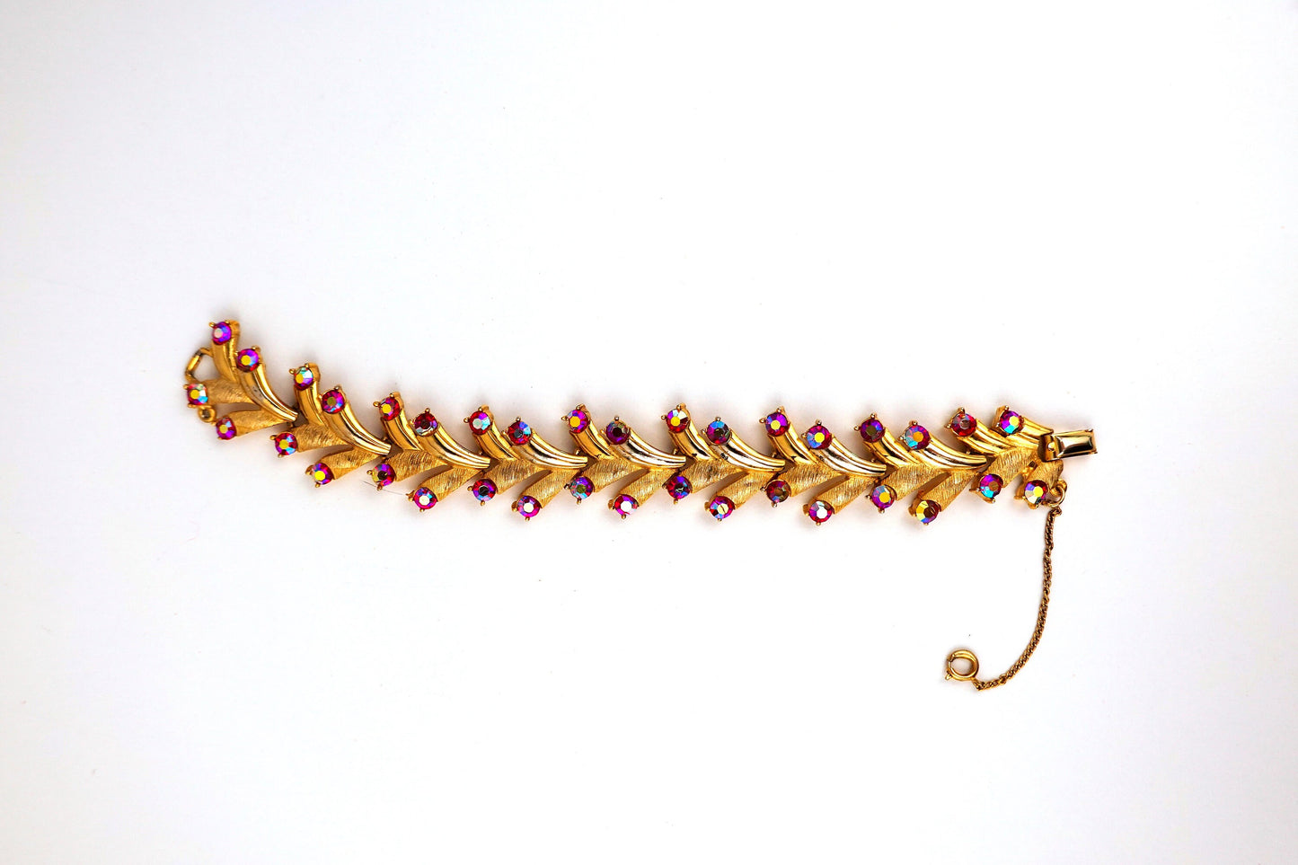 Vintage Puccini Raspberry Aurora Borealis Rhinestone Bracelet - Gold Tone Articulated Fancy Link, Leaf Motif - Mid-Century Bracelet