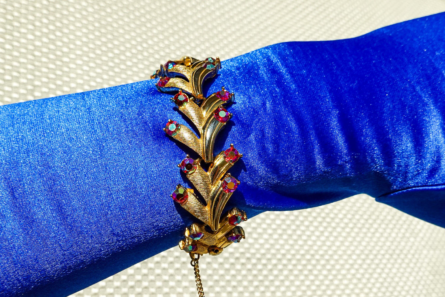 Vintage Puccini Raspberry Aurora Borealis Rhinestone Bracelet - Gold Tone Articulated Fancy Link, Leaf Motif - Mid-Century Bracelet