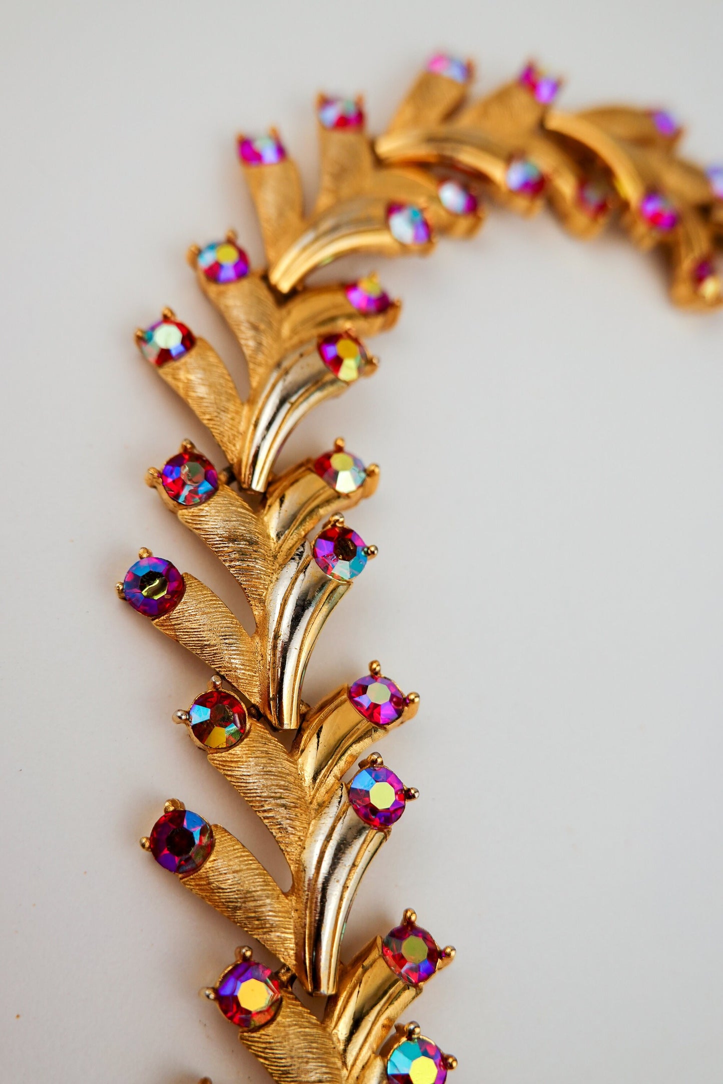 Vintage Puccini Raspberry Aurora Borealis Rhinestone Bracelet - Gold Tone Articulated Fancy Link, Leaf Motif - Mid-Century Bracelet